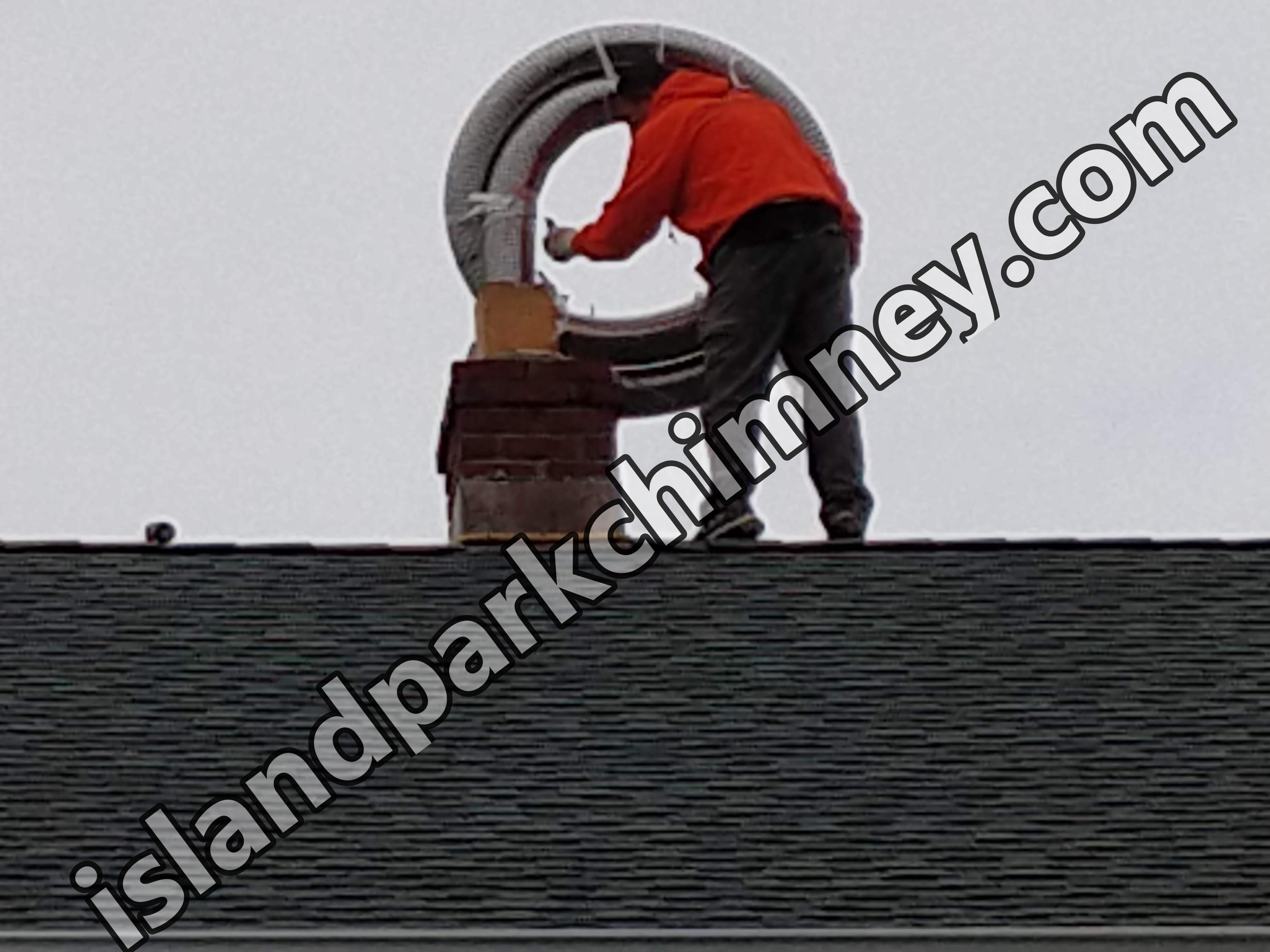Flexible stainless chimney liner being installed in Island Park, New York