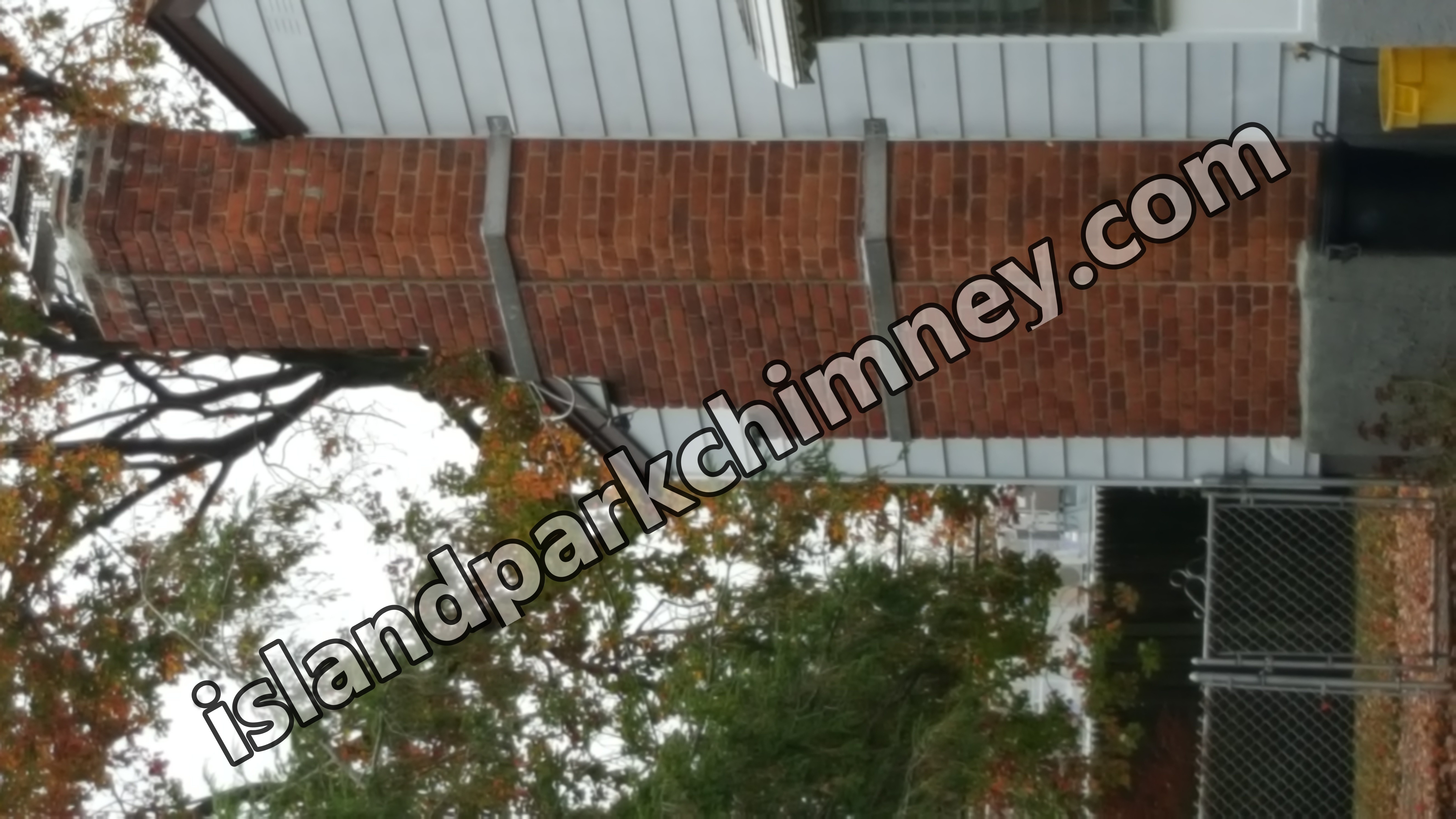 Heavy oil soot removal from chimney flue in Island Park, New York